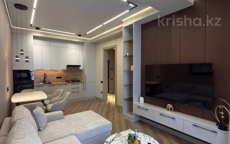 2-комнатная квартира · 65 м² · 5/16 этаж, Манаса 109а за 450 000 ₸ в Алматы, Алмалинский р-н — фото 2
