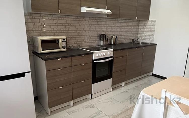 1-бөлмелі пәтер · 45 м² · 4/12 қабат, ул. Абиша Кекилбайулы, бағасы: 48 млн ₸ в Алматы, Ауэзовский р-н — фото 2