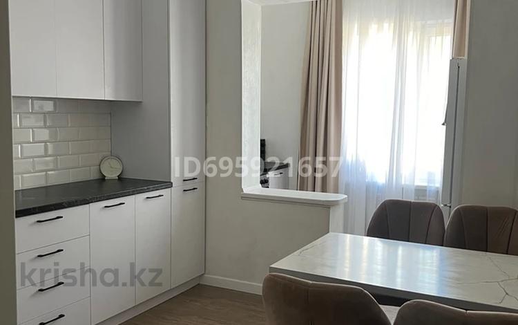 2-комнатная квартира, 65 м², 1/6 этаж, мкр Таугуль 184в/1 — Саина