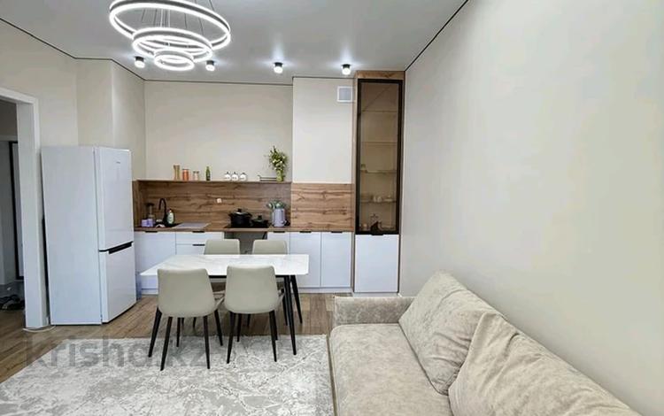 2-комнатная квартира · 50 м² · 8/12 этаж, Толе би 18 за 330 000 ₸ в Астане, Есильский р-н — фото 2