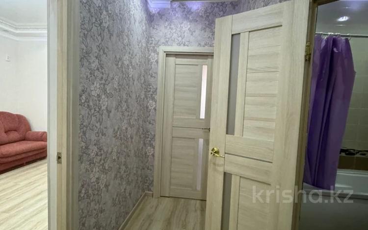 1-комнатная квартира · 49 м² · 6/9 этаж, мкр Нурсая, Таумуш Жумагалиев 15 за 20 млн ₸ в Атырау — фото 2