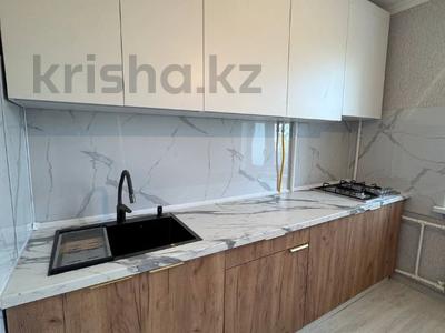 2-комнатная квартира · 56.7 м² · 4/5 этаж, жургенова 1 за 15 млн 〒 в Актобе, мкр. Курмыш