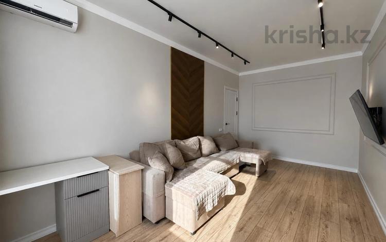 2-комнатная квартира · 65 м² · 9/9 этаж, Казыбек би 5А за 41 млн ₸ в Астане, Есильский р-н — фото 2