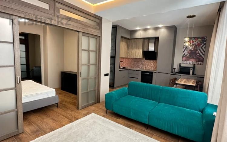 1-комнатная квартира · 49.4 м² · 3/15 этаж, 14-й мкр 84 за 27.9 млн ₸ в Актау — фото 2