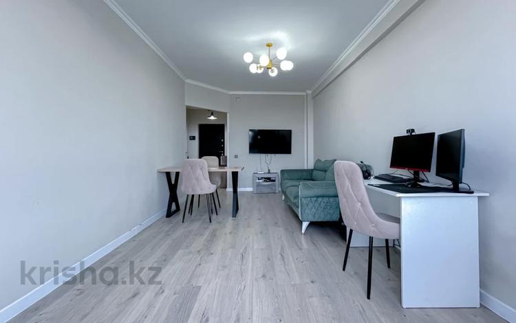 2-комнатная квартира · 50 м² · 8/12 этаж, Толе би 189/3 за 290 000 〒 в Алматы, Алмалинский р-н — фото 14