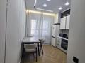 2-комнатная квартира · 63 м² · 4/18 этаж, Абая 160 7 за 59 млн ₸ в Алматы, Бостандыкский р-н — фото 2