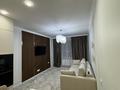 2-комнатная квартира · 52 м² · 3/12 этаж, Райымбека 210 — Райымбека-Ауезова за 385 000 ₸ в Алматы, Алмалинский р-н — фото 4