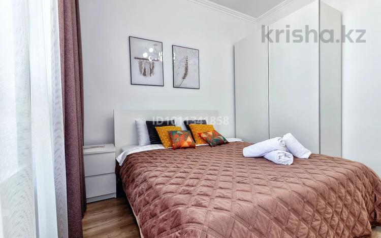 2-комнатная квартира · 70 м² · 8/8 этаж, Кабанбай батыра 60/1 за 25 000 ₸ в Астане, Есильский р-н — фото 2