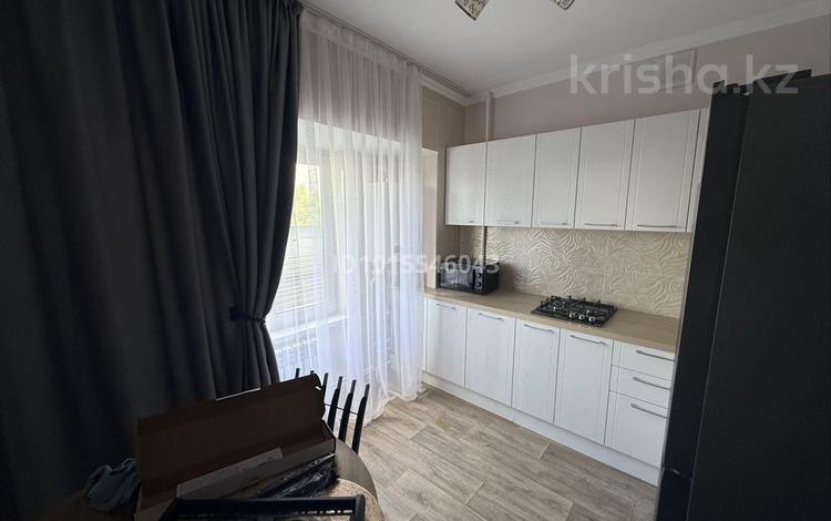 1-комнатная квартира · 40 м² · 2/5 этаж, 10 лет независимости — Окна выходят на базар Базар , больница сеным за 200 000 ₸ в Каскелене — фото 2