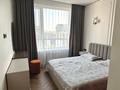 2-комнатная квартира · 70 м² · 13 этаж, Мухамедханова 6Б за 25 000 ₸ в Астане, Нура р-н — фото 5