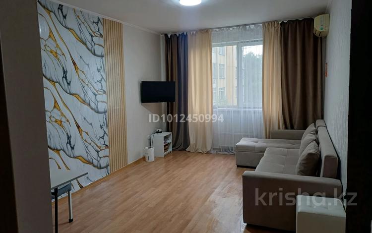2-комнатная квартира · 54 м² · 4/9 этаж, мкр Аксай-1А — Толе би Момышулы за 37 млн ₸ в Алматы, Ауэзовский р-н — фото 2
