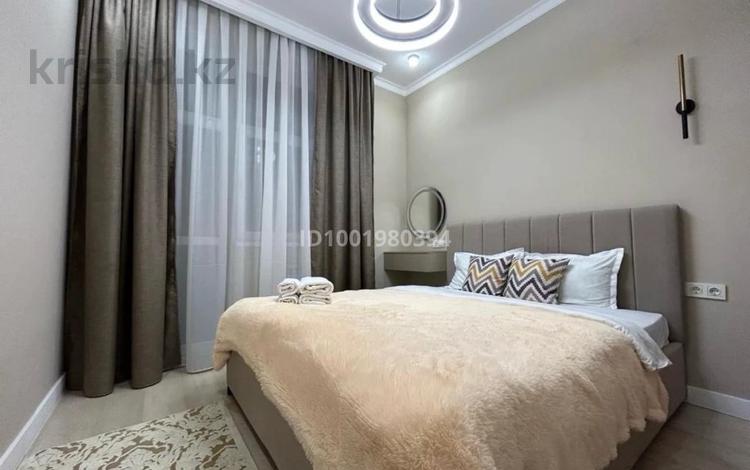 2-комнатная квартира · 52 м², Абикена Бектурова 11 за 19 900 ₸ в Астане, Нура р-н — фото 2