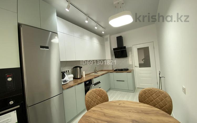 2-комнатная квартира · 52 м² · 1/9 этаж, мкр Нурсая, Мкрн Нурсая 6Б за 27 млн ₸ в Атырау — фото 2