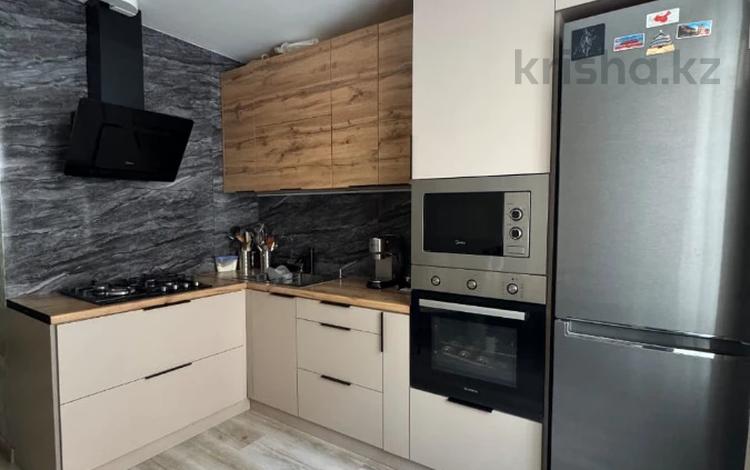 3-комнатная квартира · 75 м² · 1/5 этаж, мкр Аксай-3Б за 42 млн ₸ в Алматы, Ауэзовский р-н — фото 5