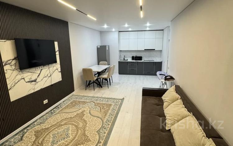 2-комнатная квартира · 55 м² · 15/16 этаж, Утепова 31 за 380 000 ₸ в Алматы, Бостандыкский р-н — фото 2