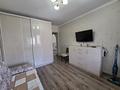 4-комнатная квартира · 83.8 м² · 5/5 этаж, мкр Аксай-3 33 за 55 млн ₸ в Алматы, Ауэзовский р-н — фото 8