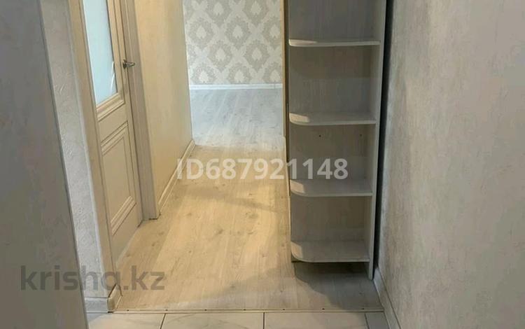 3-комнатная квартира · 60 м² · 5/5 этаж, мкр Аксай-2 18 — Толе Би- Момыш улы за 300 000 〒 в Алматы, Ауэзовский р-н — фото 7