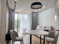 2-комнатная квартира · 52 м² · 2/12 этаж, Бауыржана Момышулы — Монке би за 350 000 ₸ в Алматы, Алатауский р-н — фото 2