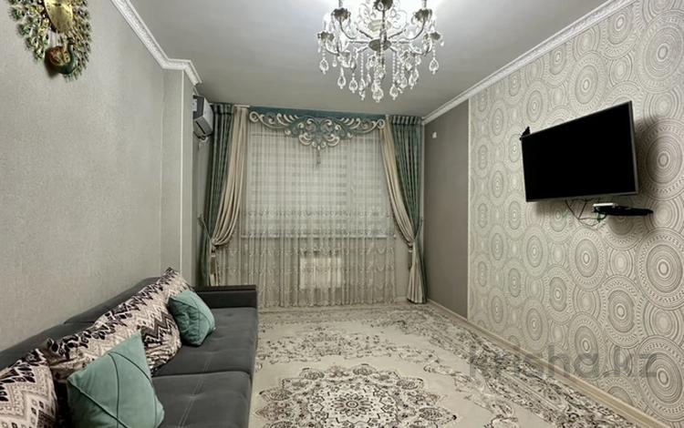 2-бөлмелі пәтер · 65 м² · 4/9 қабат, ул. Куаныша Тулеметова 69/32, бағасы: 180 000 ₸ в Шымкенте, Абайский р-н — фото 2