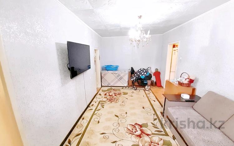 3-комнатная квартира, 54 м², 2/4 этаж, Быржан сал за 12.8 млн 〒 в Талдыкоргане — фото 2