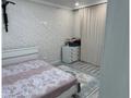 2-комнатная квартира · 65 м² · 8/12 этаж, просп. Тауелсиздик 34/10 за 36.5 млн ₸ в Астане, Алматы р-н — фото 2