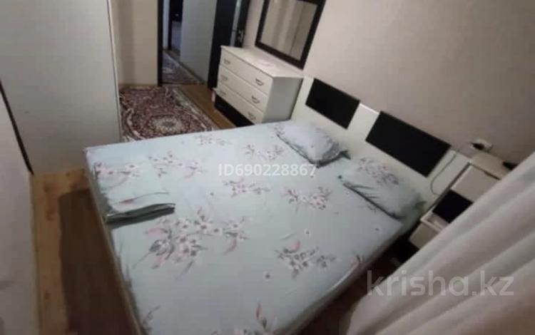 2-бөлмелі пәтер, 50 м², 4/5 қабат ай сайын, Айтеке би 27 — Возле площади, бағасы: 200 000 〒 в  — фото 2