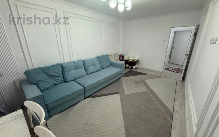 2-комнатная квартира · 52 м² · 2/5 этаж, мкр Аксай-4 за 44 млн ₸ в Алматы, Ауэзовский р-н — фото 2