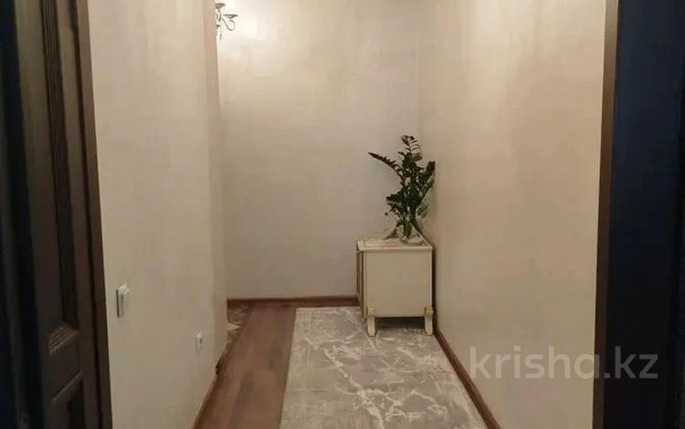 1-бөлмелі пәтер · 50 м² · 2/9 қабат, Нұркент ш/а — ул. Момыш улы, бағасы: 28.5 млн ₸ в Алматы, Алатауский р-н — фото 3