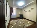 4-комнатная квартира, 120 м², 17 этаж помесячно, Кабанбай батыра 43 за 450 000 〒 в Астане, Есильский р-н — фото 10