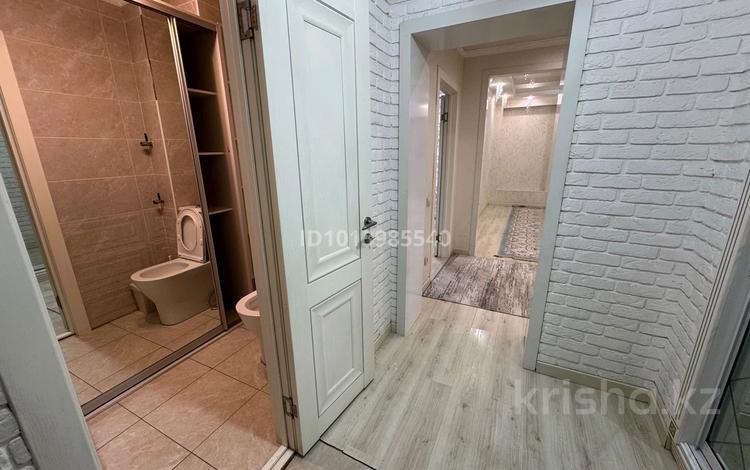 3-комнатная квартира · 93.3 м² · 5/10 этаж, мкр Аксай, Б. Момышулы за 65 млн ₸ в Алматы, Ауэзовский р-н — фото 2