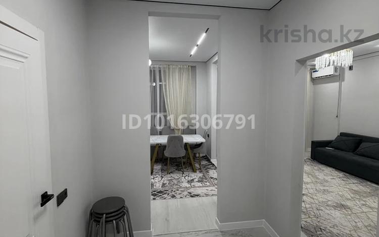 2-комнатная квартира · 55.2 м², мкр Коккайнар, 20-й микрорайон 47к1 за 260 000 ₸ в Алматы, Алатауский р-н — фото 2