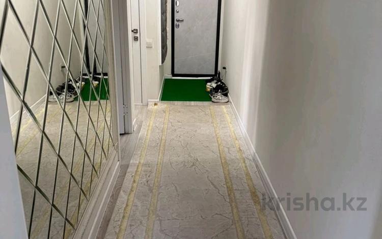 3-бөлмелі пәтер · 58 м² · 4/5 қабат, мкр Аксай-1, бағасы: 39.5 млн ₸ в Алматы, Ауэзовский р-н — фото 2