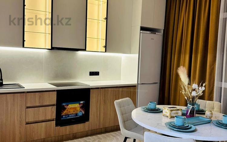 2-комнатная квартира · 55 м² · 4/13 этаж, Манаса 109а за 450 000 ₸ в Алматы, Алмалинский р-н — фото 2