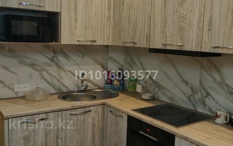 2-комнатная квартира · 52 м² · 2/5 этаж, мкр Юго-Восток, Сатыбалдина 4/1 за 350 000 ₸ в Караганде, Казыбек би р-н — фото 2