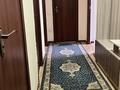 2-комнатная квартира, 61 м², 9/9 этаж помесячно, мкр Аксай-1А 26 А за 210 000 〒 в Алматы, Ауэзовский р-н