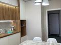 2 комнаты · 59 м² · 9/12 этаж, Кошкарбаева 39в за 110 000 ₸ в Алматы — фото 5