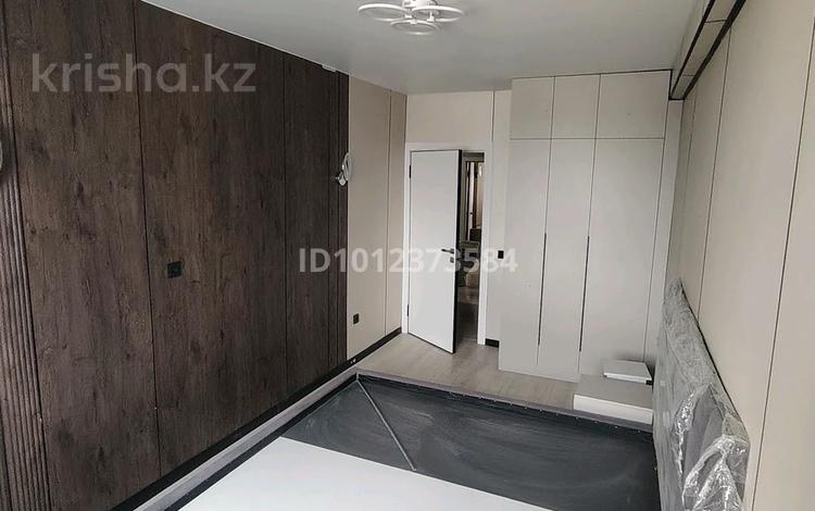 2-комнатная квартира · 59 м² · 7/7 этаж, мкр Ожет 92/1 за 300 000 ₸ в Алматы, Алатауский р-н — фото 2