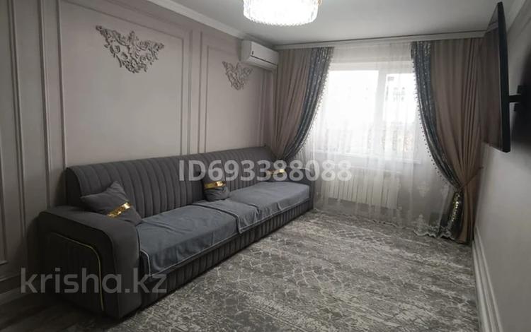 2-комнатная квартира, 59 м², 4/10 этаж, Байгазиева 35б за 33 млн 〒 в Каскелене — фото 2