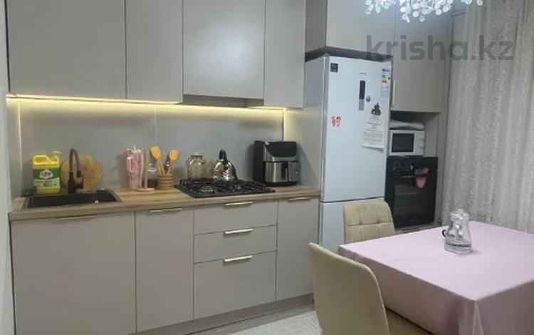 3-комнатная квартира · 78 м² · 1/5 этаж, мкр Аксай-3А за 45 млн ₸ в Алматы, Ауэзовский р-н — фото 11