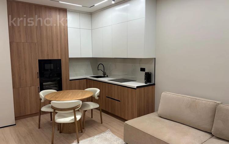 2-комнатная квартира · 52 м² · 6/18 этаж, Сыганак 28 за 450 000 ₸ в Астане, Нура р-н — фото 2