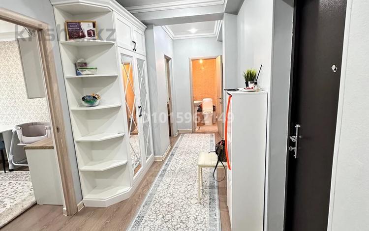 2-комнатная квартира · 67 м² · 6/9 этаж, мкр Нурсая, Таумуш Жумагалиева 17а за 250 000 ₸ в Атырау — фото 2