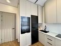 2-комнатная квартира · 56.5 м² · 17/18 этаж, Е-36, E-15 2, 4, 5, 9, 11 за 48 млн ₸ в Астане, Нура р-н — фото 4