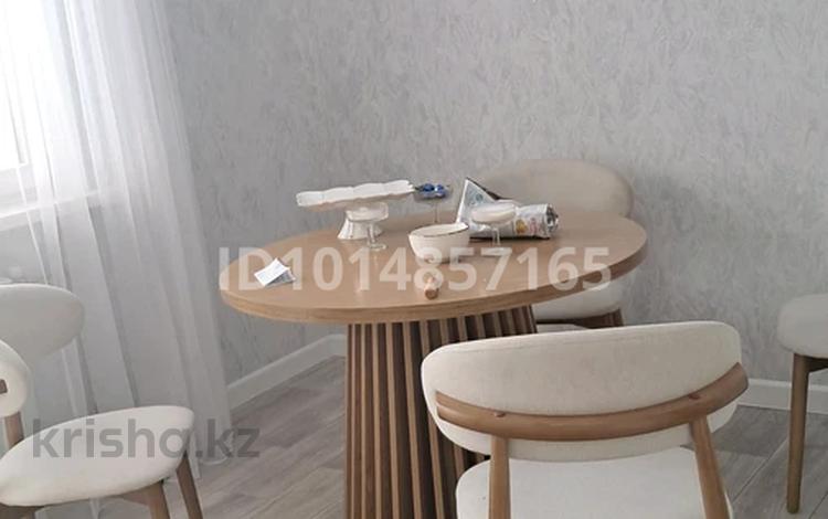 1-комнатная квартира · 54 м² · 4/9 этаж, мкр Аксай-1А 27 за 35.5 млн ₸ в Алматы, Ауэзовский р-н — фото 2