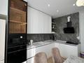 2-комнатная квартира · 65 м² · 4/12 этаж, Розыбакиева 320 за 70 млн ₸ в Алматы, Бостандыкский р-н — фото 4