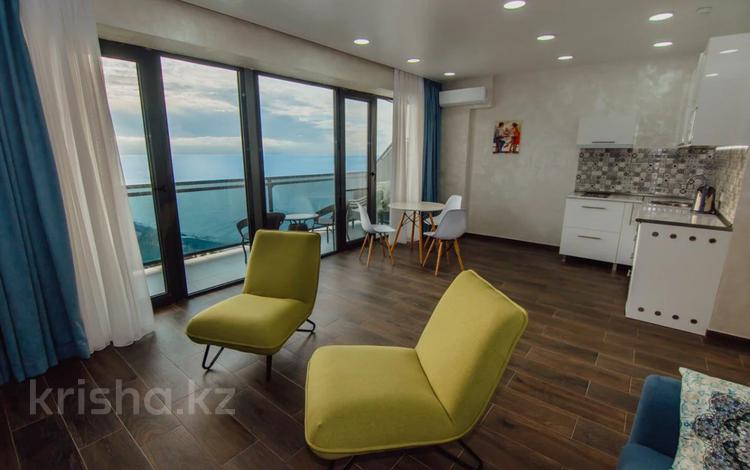 2-комнатная квартира · 57 м² · 26 этаж, Шерифа Химшиашвили 57 за ~ 66.3 млн 〒 в Батуми — фото 2