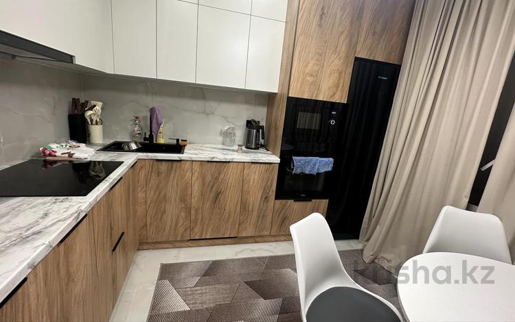 1-комнатная квартира · 50 м² · 5/12 этаж, мкр Гажайып 5/1 за 42.9 млн ₸ в Алматы, Алатауский р-н — фото 2