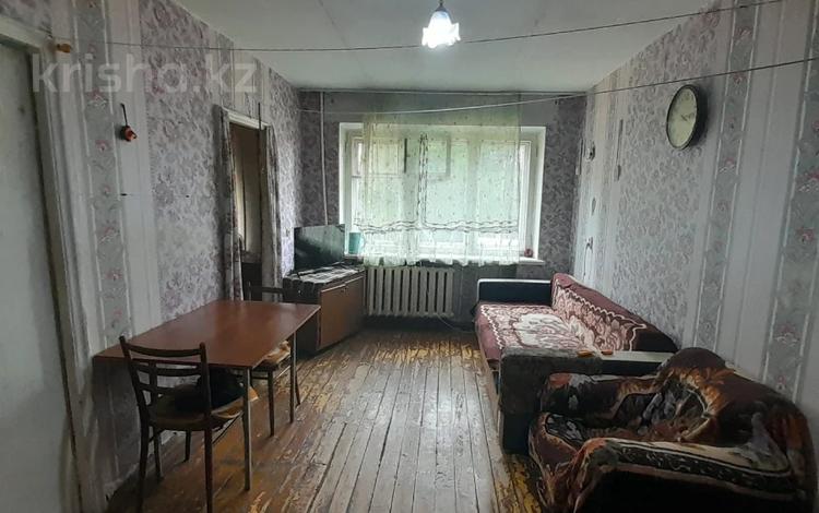 4-комнатная квартира · 60.7 м² · 2/5 этаж, Пришахтинск, 21й микрорайон 29 за 14 млн ₸ в Караганде, Алихана Бокейханова р-н — фото 2