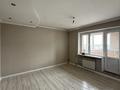 3-комнатная квартира · 65 м² · 12/12 этаж, мкр Аксай-1А — Толе би Момышулы за 35.5 млн ₸ в Алматы, Ауэзовский р-н — фото 10