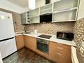 2-комнатная квартира · 56 м² · 5/14 этаж, мкр Керемет 7к27 — ул. Наурызбай батыра за 400 000 ₸ в Алматы, Бостандыкский р-н — фото 5