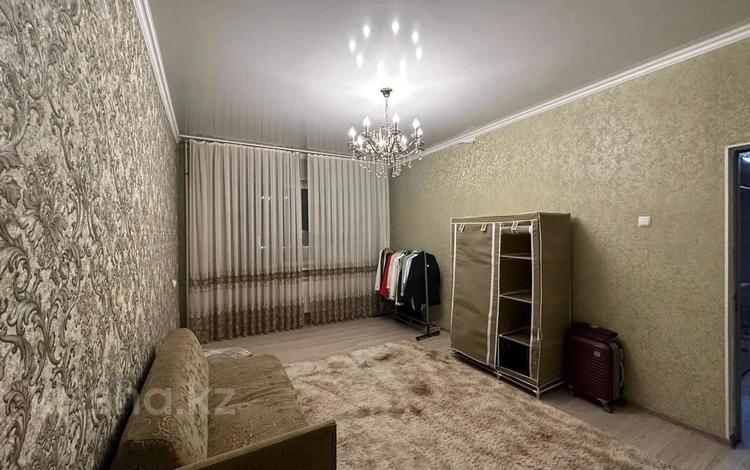 2-комнатная квартира · 56 м² · 5/9 этаж, мкр Аксай-3 за 35.5 млн ₸ в Алматы, Ауэзовский р-н — фото 2